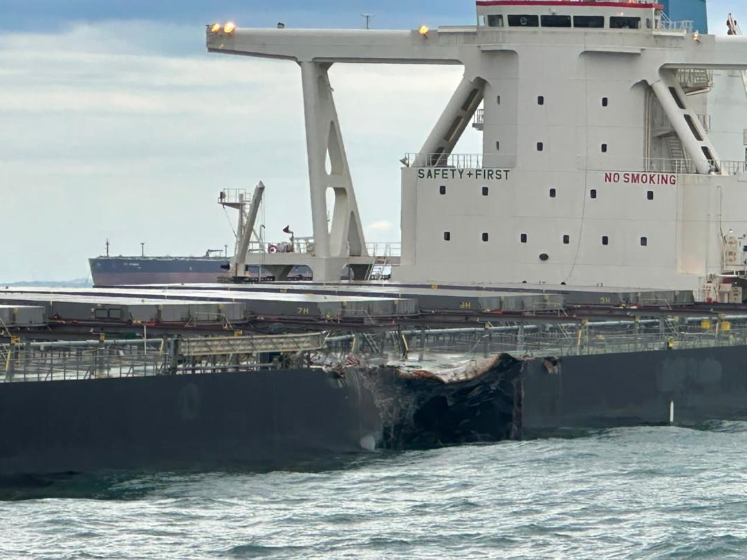 Hull damage sustained by M/V HUGE KUMANO following the collision